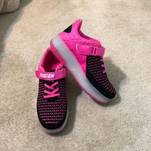 Light up shoes with wheels.